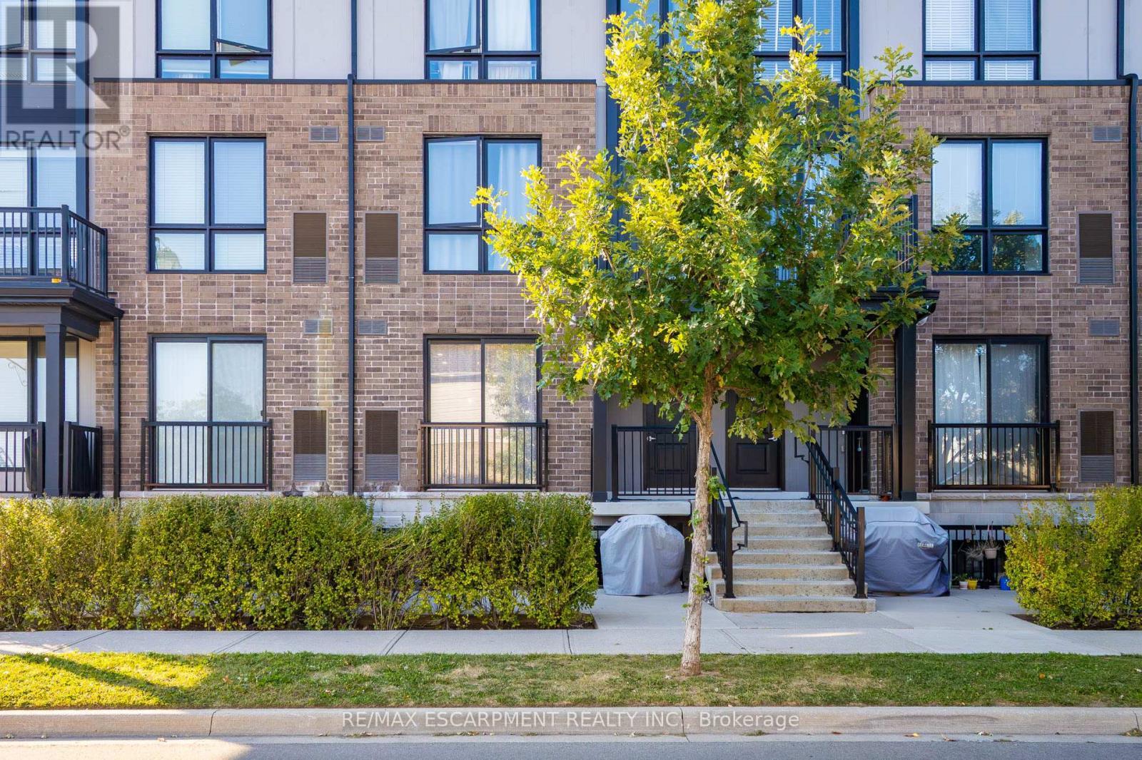 107 - 1206 Main Street E, Milton, ON - Outdoor With Balcony With Facade