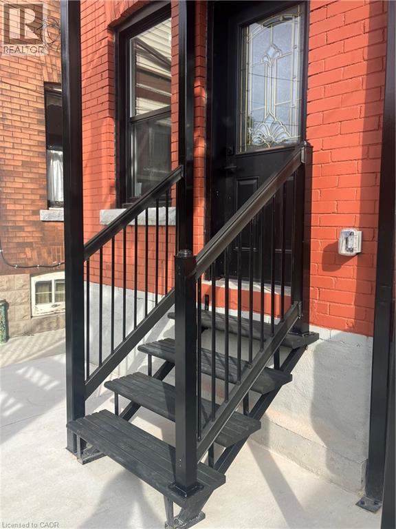 Separate back entry with new staircase to kitchen - 15 Barnesdale Avenue N, Hamilton, ON - Photo Showing Other Room