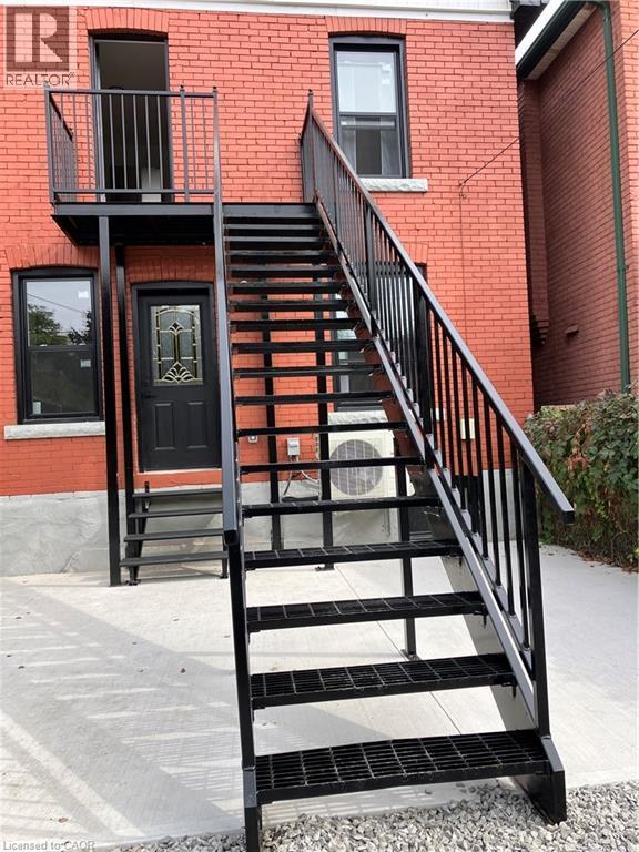 Separate entry to 2nd flr unit, new steel staircase. - 15 Barnesdale Avenue N, Hamilton, ON - Outdoor With Exterior
