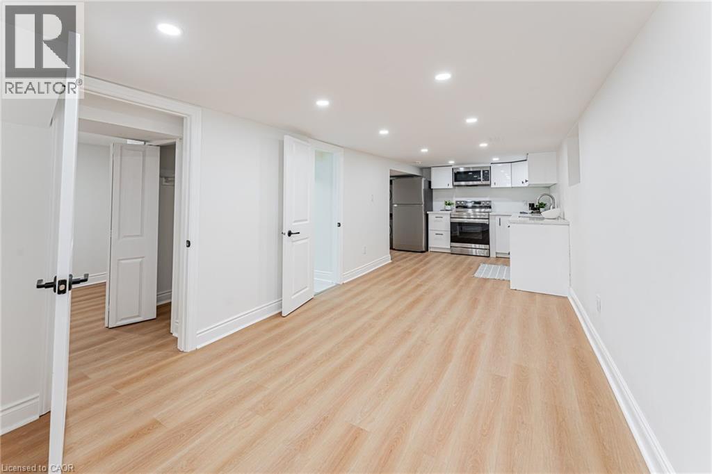 Bright living room & dining areas. - 15 Barnesdale Avenue N, Hamilton, ON - Indoor