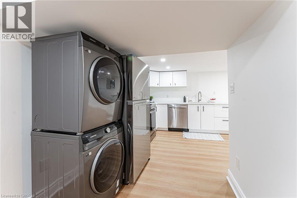 Private laundry in each unit. Will impress! - 15 Barnesdale Avenue N, Hamilton, ON - Indoor Photo Showing Laundry Room