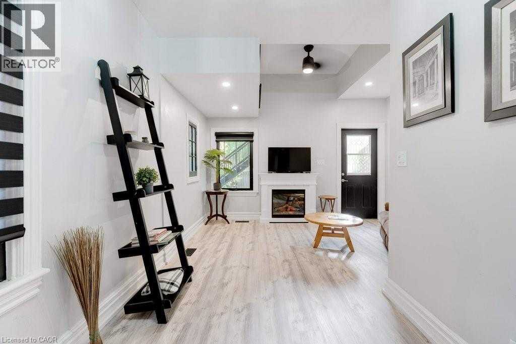 7 Homewood Avenue, Hamilton, ON - Indoor With Fireplace