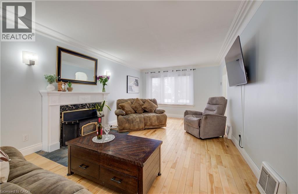 76 Brentwood Avenue, Kitchener, ON - Indoor Photo Showing Living Room With Fireplace