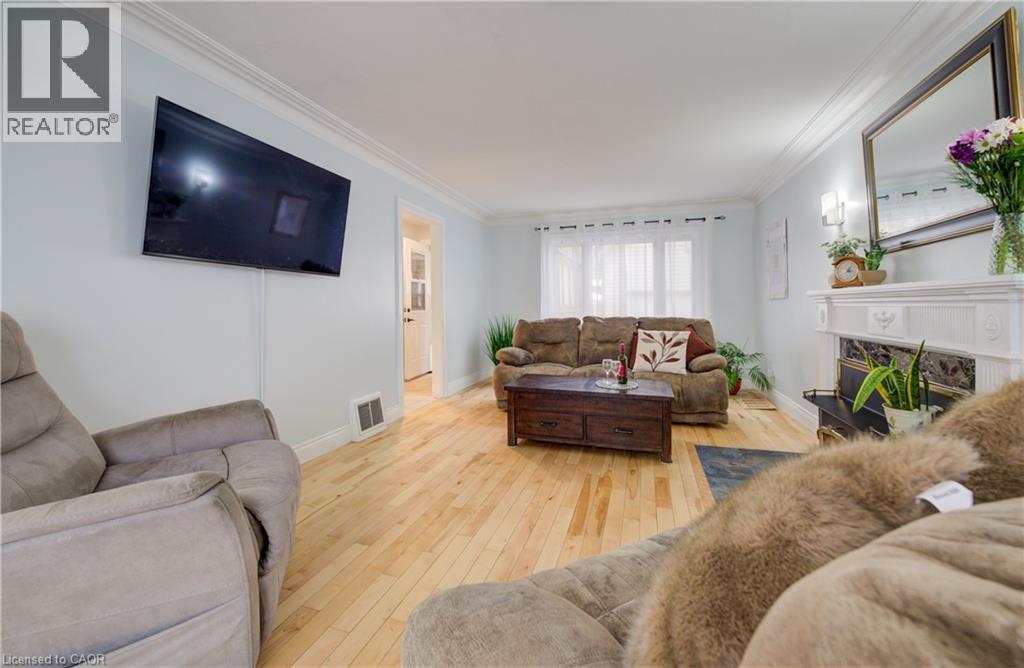 76 Brentwood Avenue, Kitchener, ON - Indoor Photo Showing Living Room With Fireplace