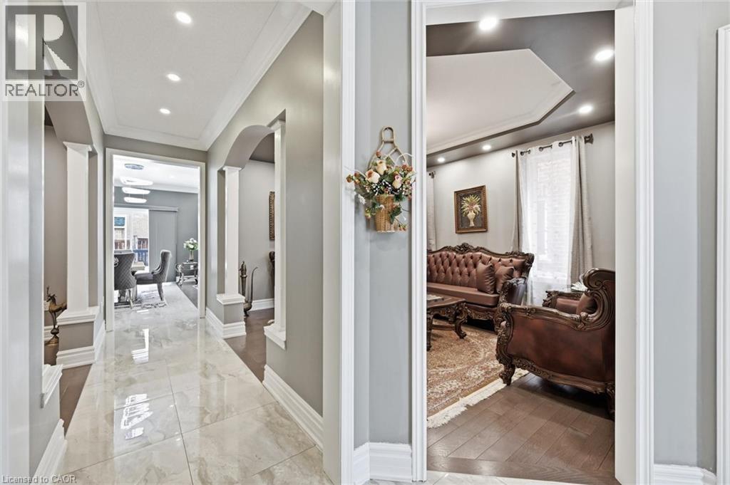 Corridor with arched walkways, ornamental molding, plenty of natural light, and recessed lighting - 456 Valridge Drive, Ancaster, ON - Indoor Photo Showing Other Room
