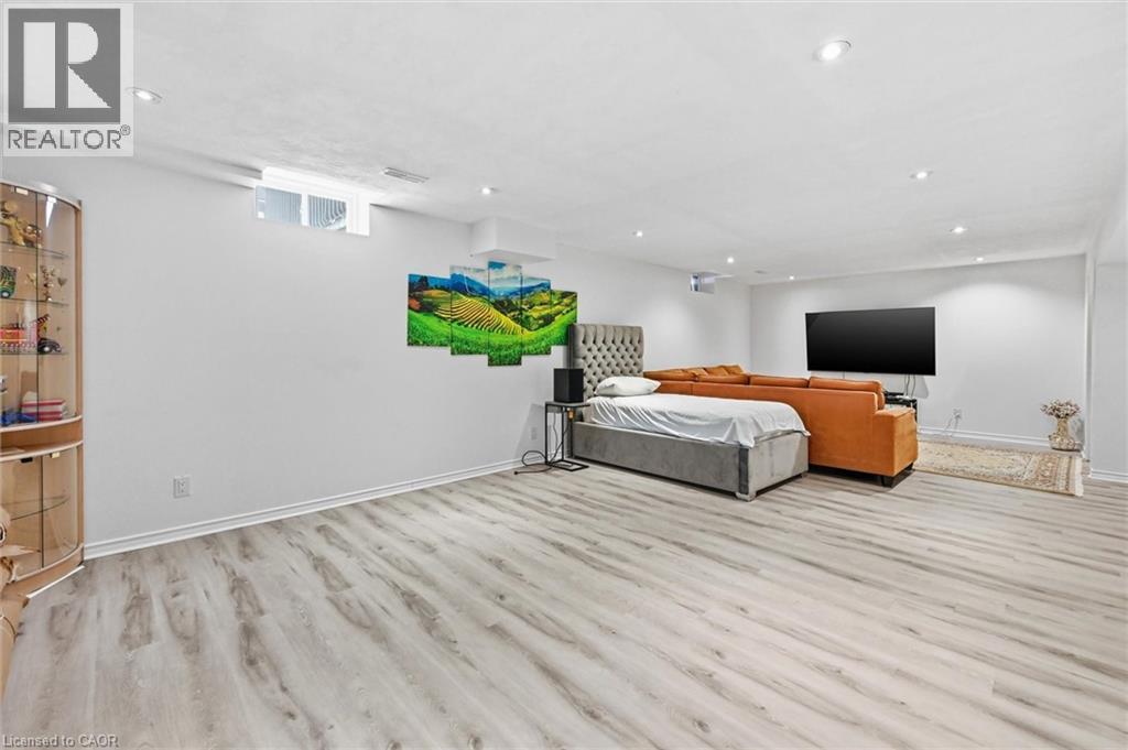 Bedroom with light wood finished floors and recessed lighting - 456 Valridge Drive, Ancaster, ON - Indoor