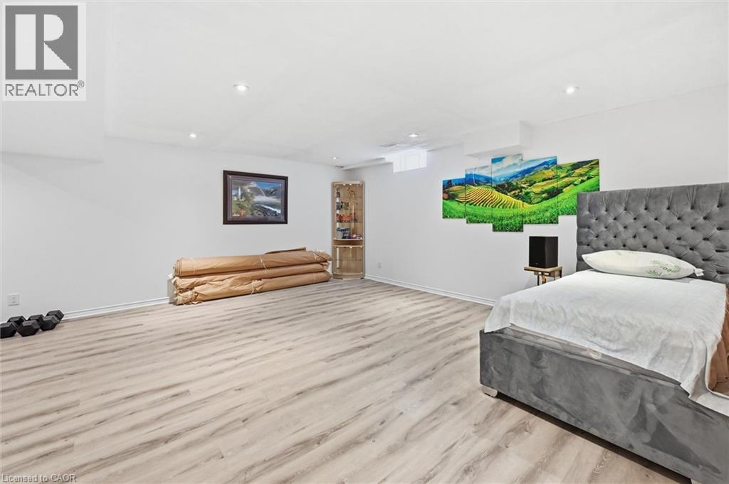 Bedroom with wood finished floors and recessed lighting - 456 Valridge Drive, Ancaster, ON - Indoor Photo Showing Bedroom