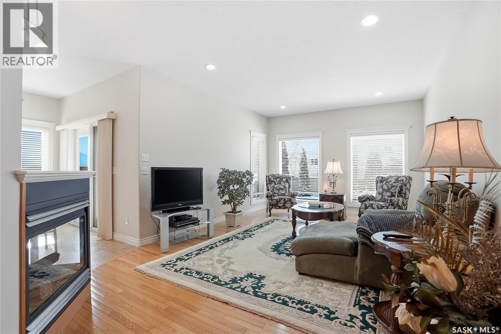110 Brookshire Crescent, Saskatoon, SK - Indoor Photo Showing Living Room With Fireplace