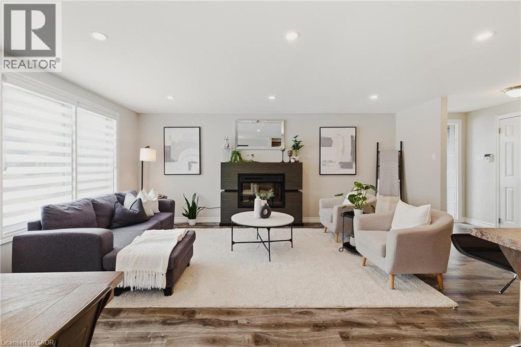 322 Sandowne Drive, Waterloo, ON - Indoor Photo Showing Living Room With Fireplace