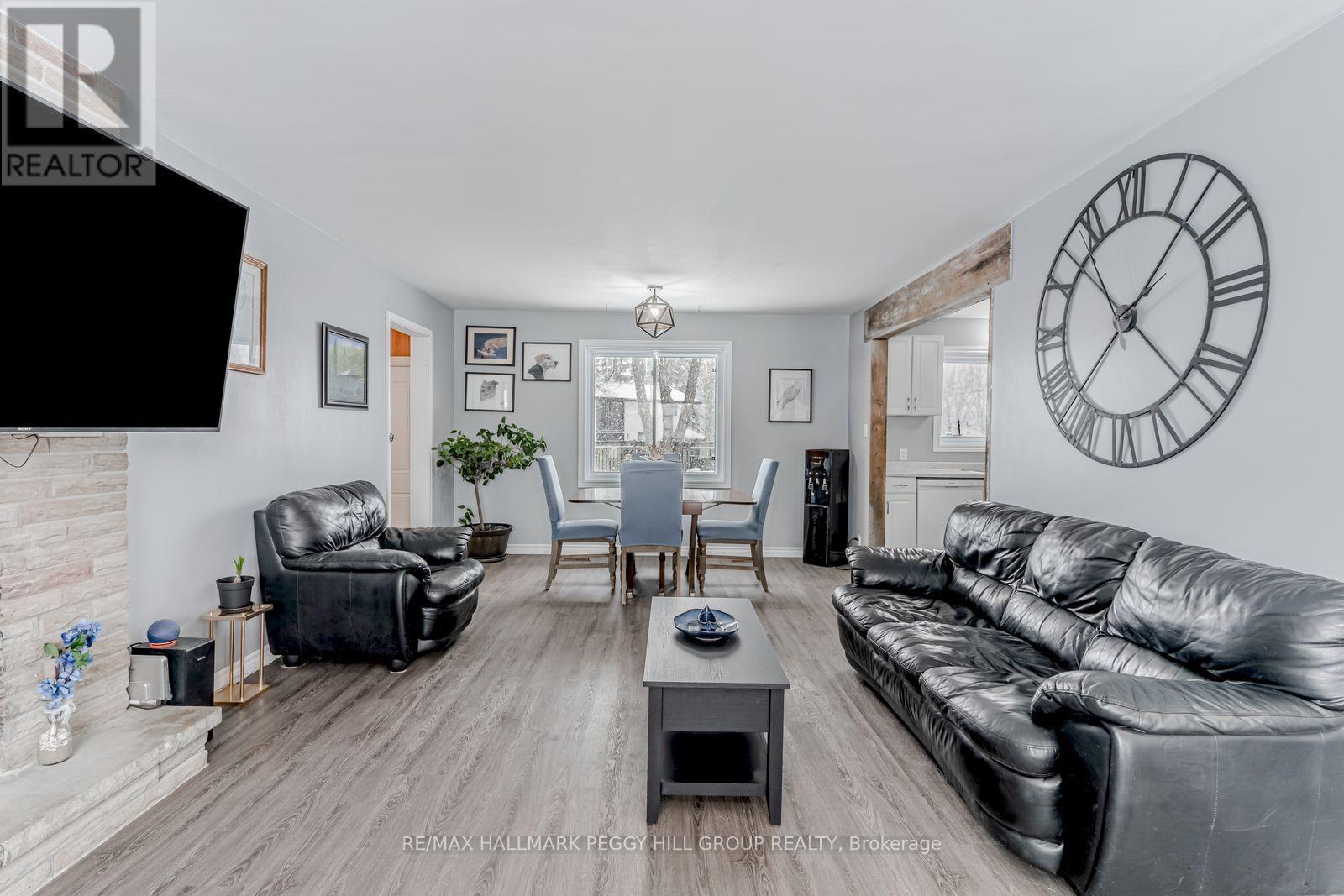 90 Queen Street E, Springwater, ON - Indoor Photo Showing Living Room