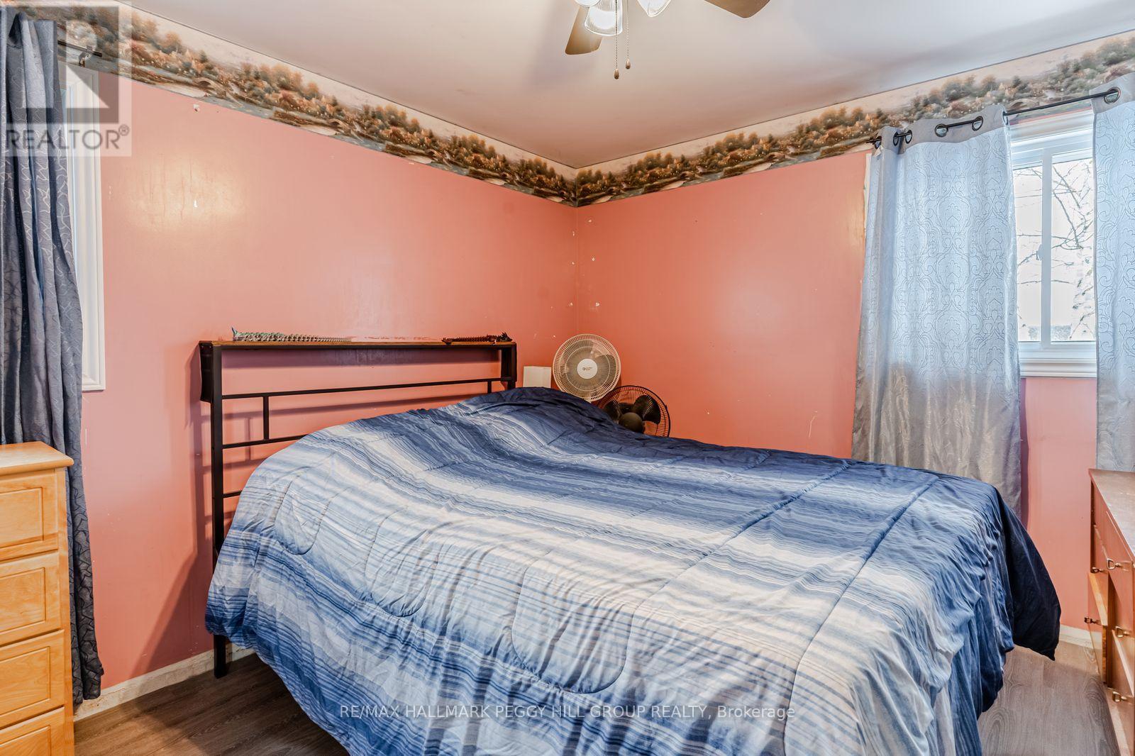 90 Queen Street E, Springwater, ON - Indoor Photo Showing Bedroom