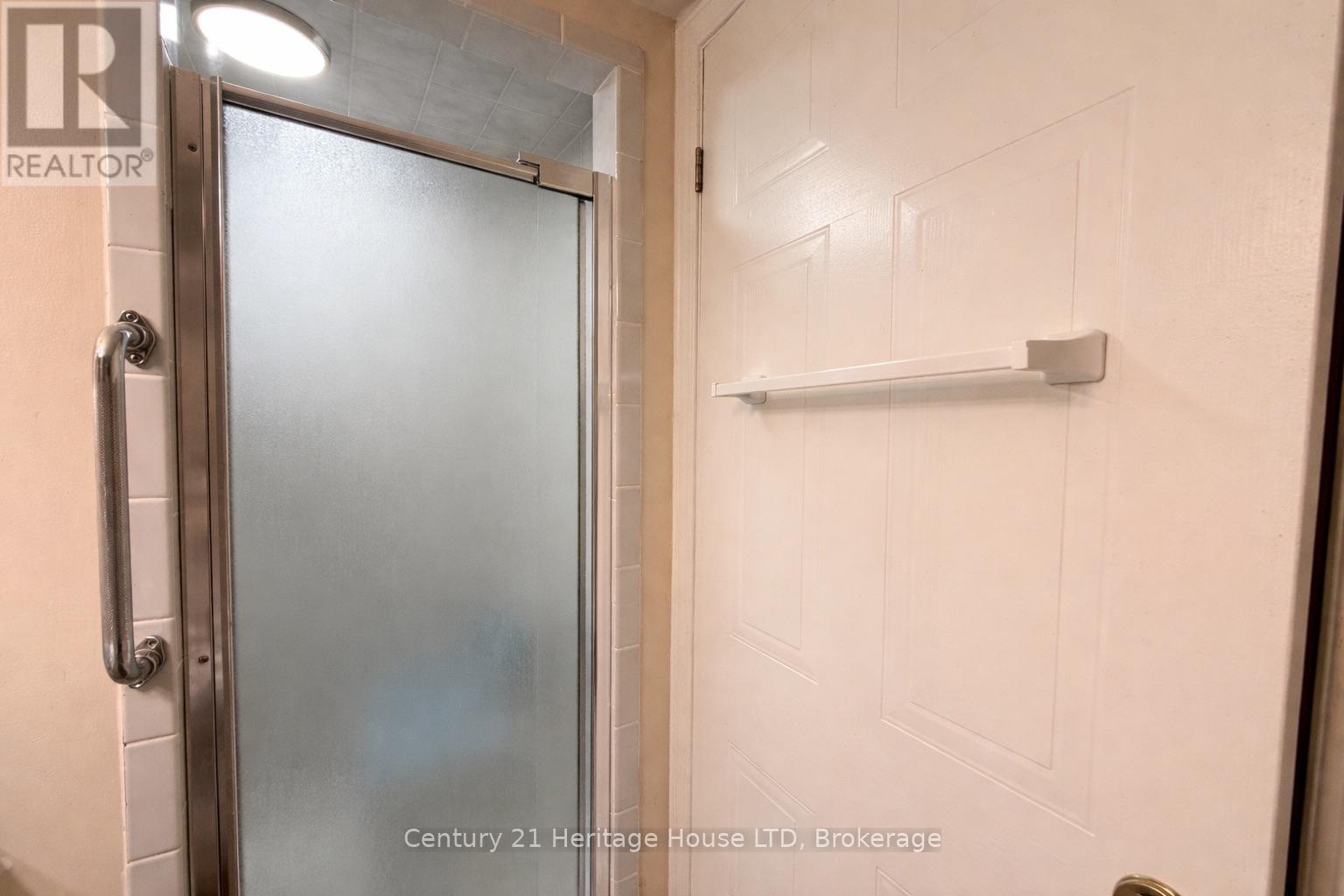 Bathroom walk in shower - 504 - 81 Scott Street, St. Catharines (Lakeport), ON - Indoor Photo Showing Bathroom