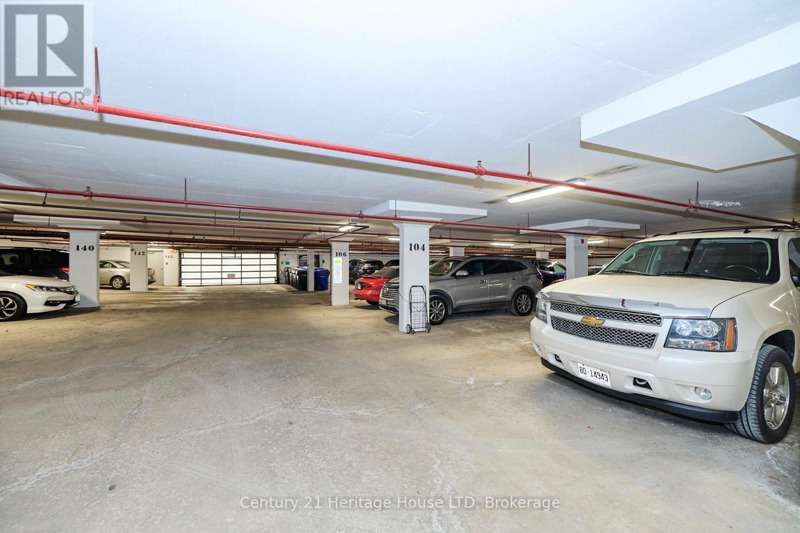 Parking - 504 - 81 Scott Street, St. Catharines (Lakeport), ON - Indoor Photo Showing Garage