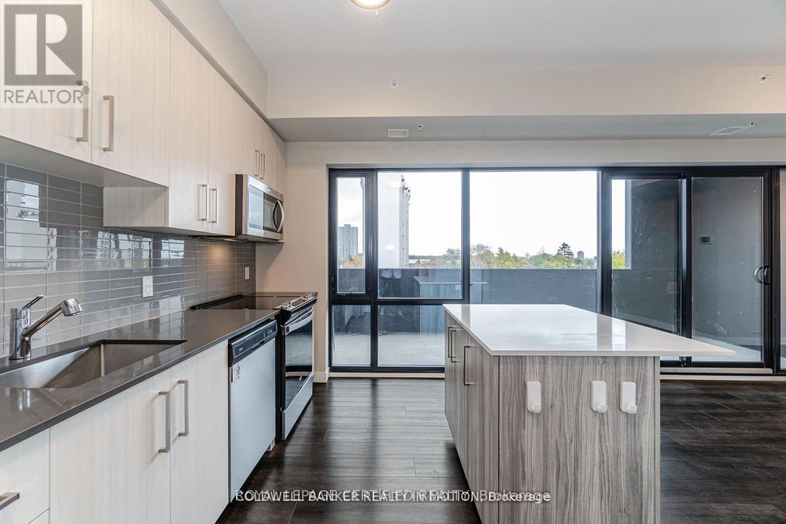 303 - 15 Queen Street S, Hamilton, ON - Indoor Photo Showing Kitchen With Stainless Steel Kitchen With Upgraded Kitchen