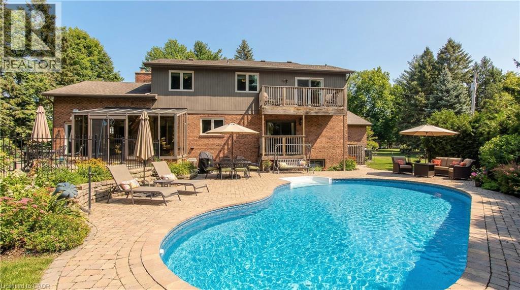2431 Britannia Road, Burlington, ON - Outdoor With In Ground Pool With Deck Patio Veranda With Backyard