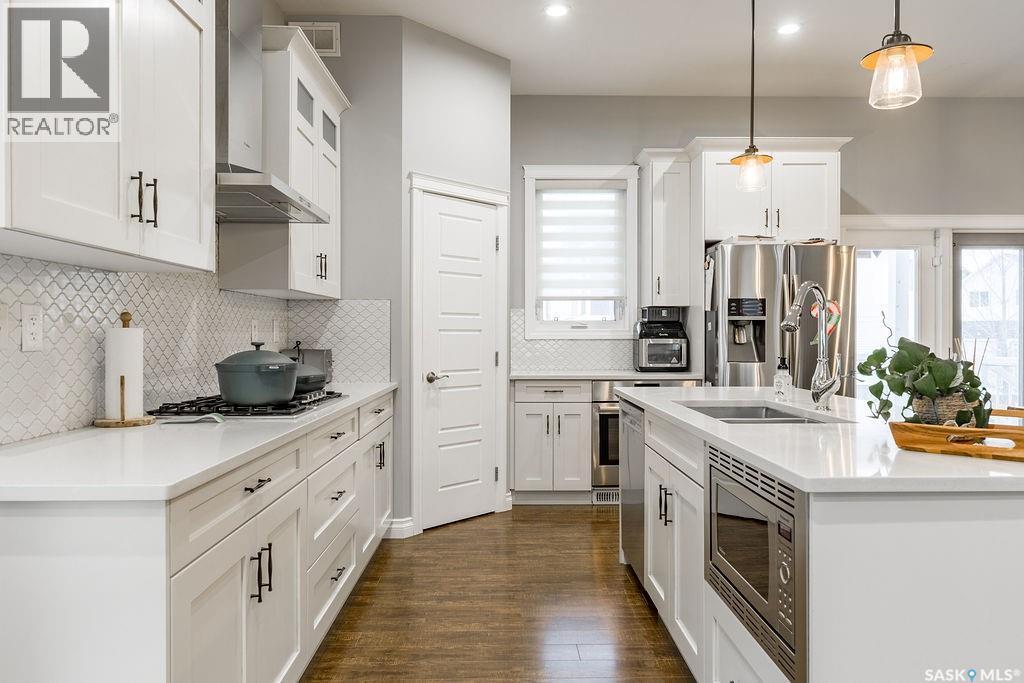 602 Kloppenburg Terrace, Saskatoon, SK - Indoor Photo Showing Kitchen With Double Sink With Upgraded Kitchen