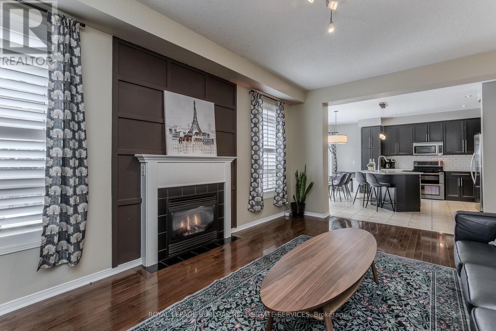 2170 Jardine Crescent, Burlington, ON - Indoor Photo Showing Living Room With Fireplace