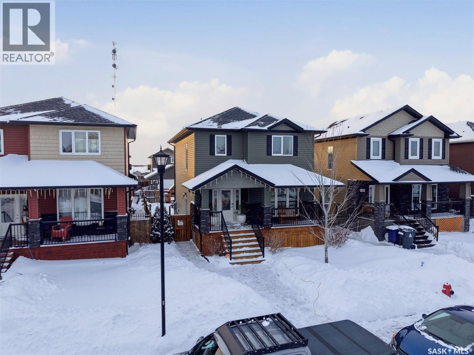 417 Golden Willow Way, Warman, SK - Outdoor With Deck Patio Veranda With Facade