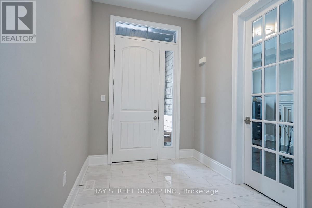 Bright Front Foyer with Transom Window - 39 Cairns Gate, King, ON - Indoor Photo Showing Other Room