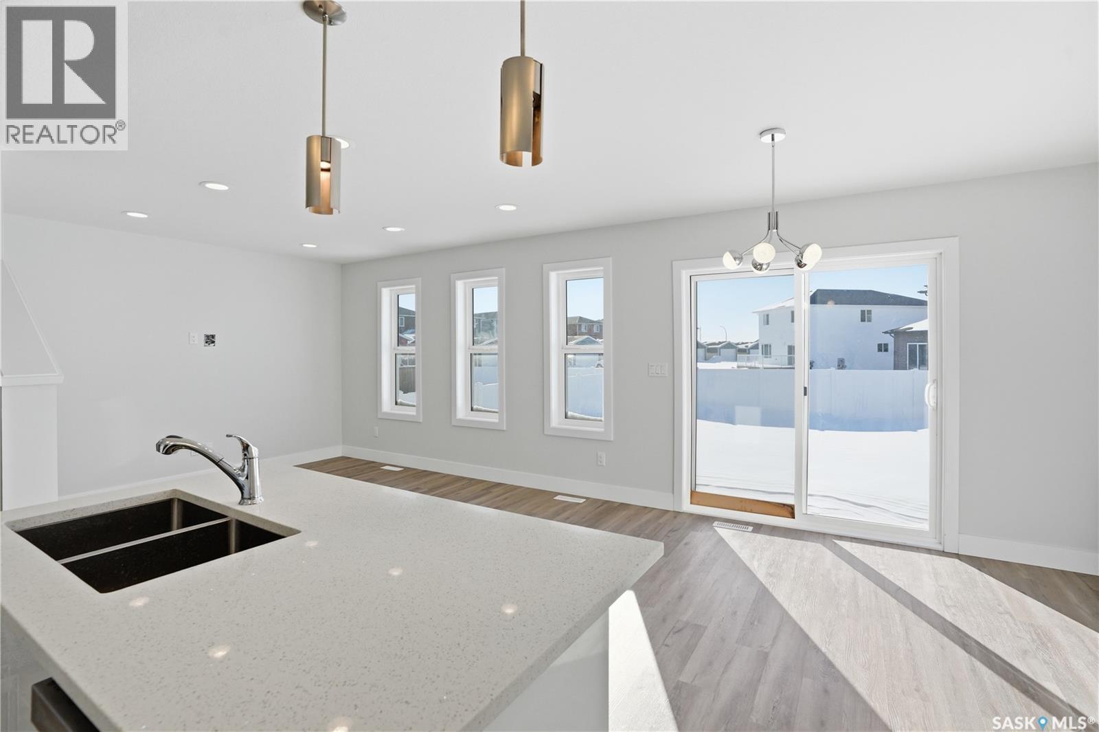111 Stromberg Crescent, Saskatoon, SK - Indoor Photo Showing Kitchen With Double Sink
