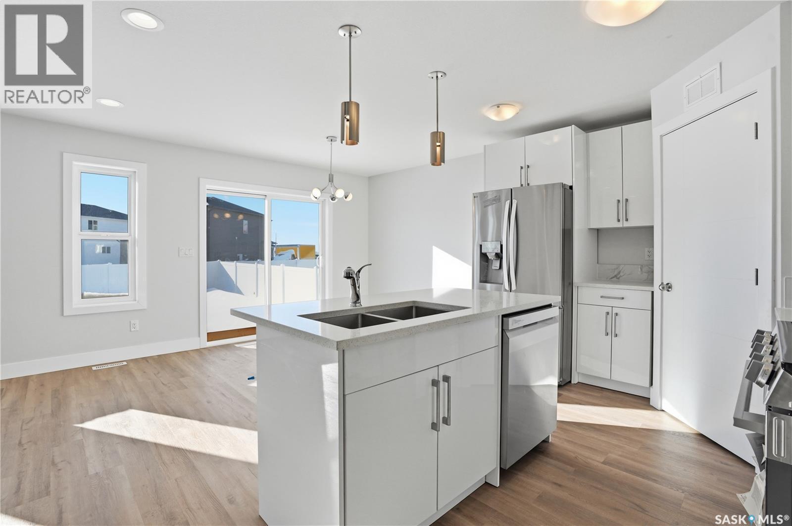 111 Stromberg Crescent, Saskatoon, SK - Indoor Photo Showing Kitchen With Double Sink With Upgraded Kitchen