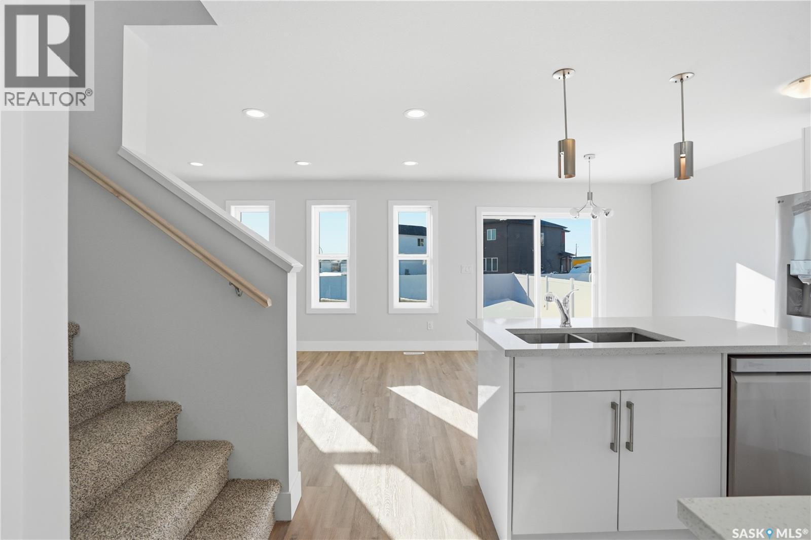 111 Stromberg Crescent, Saskatoon, SK - Indoor Photo Showing Kitchen With Double Sink