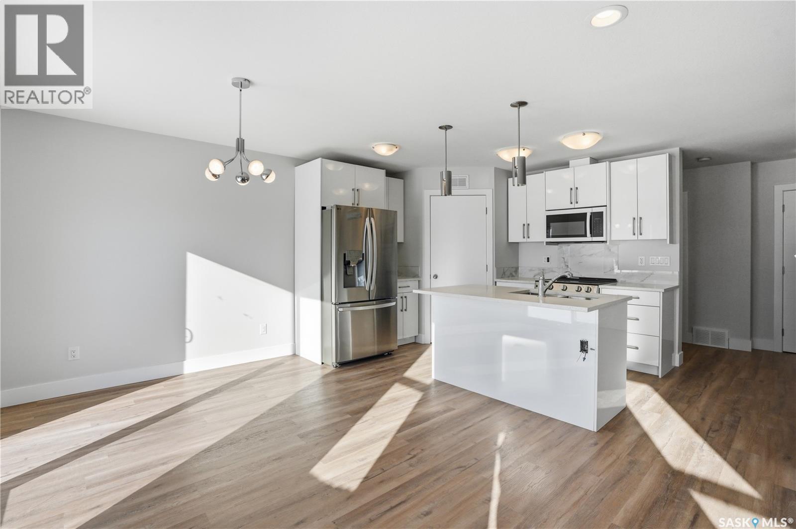 111 Stromberg Crescent, Saskatoon, SK - Indoor Photo Showing Kitchen With Upgraded Kitchen