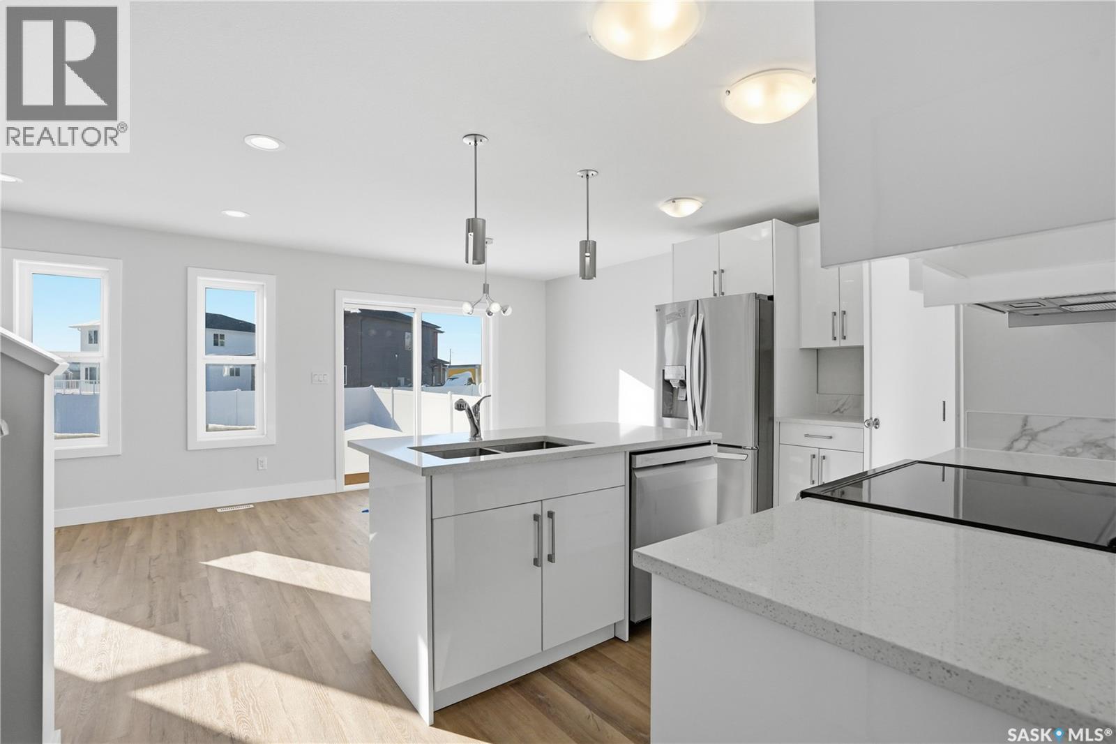 111 Stromberg Crescent, Saskatoon, SK - Indoor Photo Showing Kitchen With Double Sink