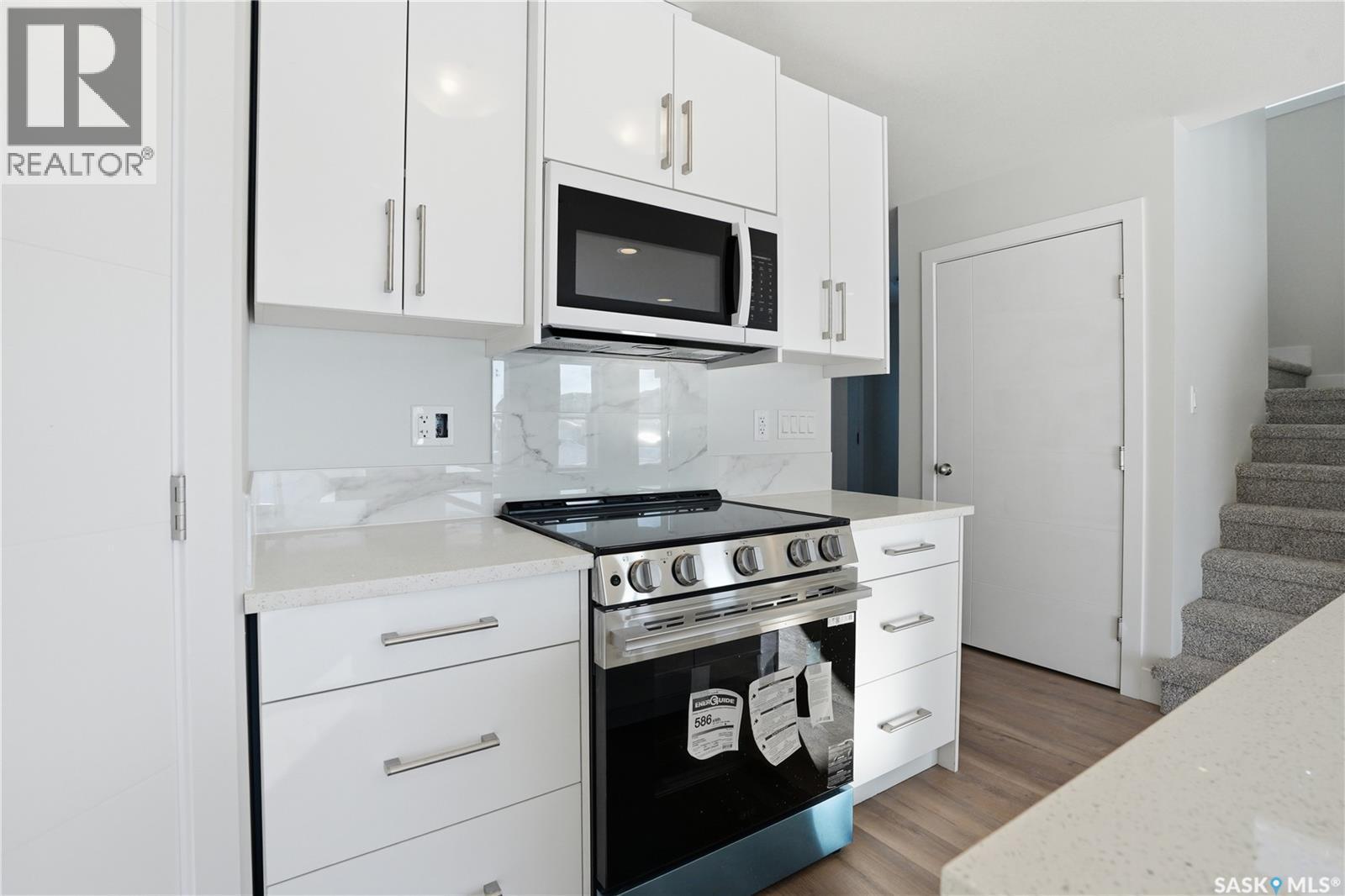 111 Stromberg Crescent, Saskatoon, SK - Indoor Photo Showing Kitchen With Upgraded Kitchen