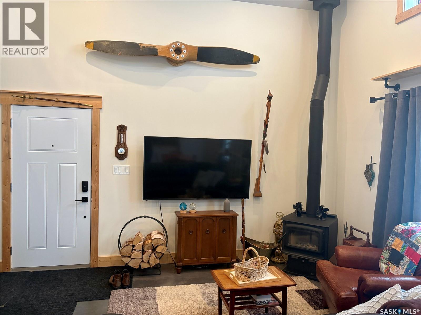 29 Riverview Road, Rosthern Rm No. 403, SK - Indoor Photo Showing Living Room With Fireplace