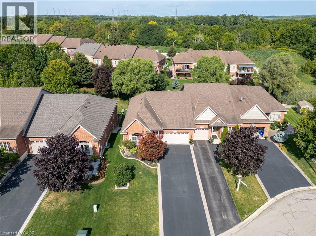 Digitally enhanced - 13 Iron Bridge Court, Caledonia, ON - Outdoor With Facade