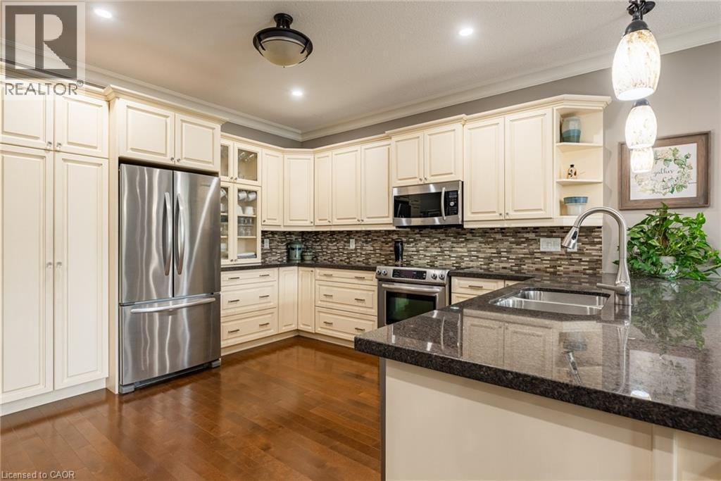 13 Iron Bridge Court, Caledonia, ON - Indoor Photo Showing Kitchen With Double Sink With Upgraded Kitchen