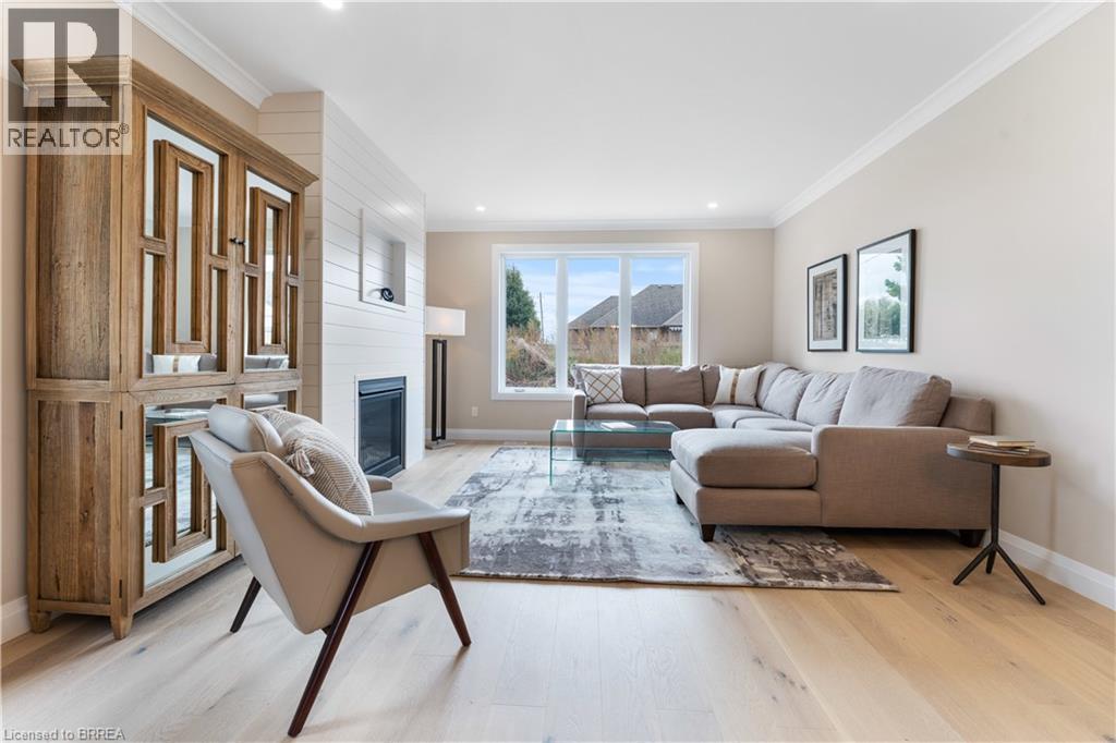 *TO BE BUILT - SIMILAR NOT EXACT* - 111 Judd Drive, Simcoe, ON - Indoor Photo Showing Living Room With Fireplace