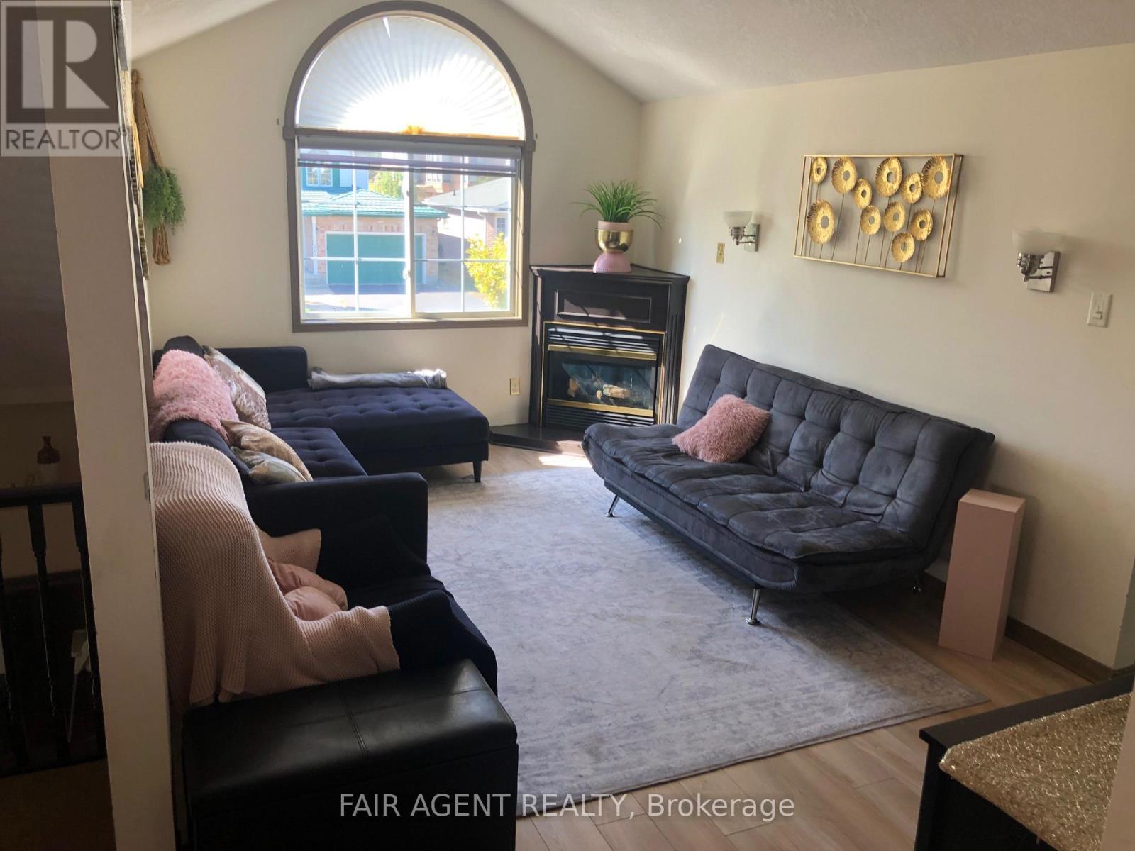 562 Erinbrook Drive, Kitchener, ON - Indoor Photo Showing Living Room With Fireplace
