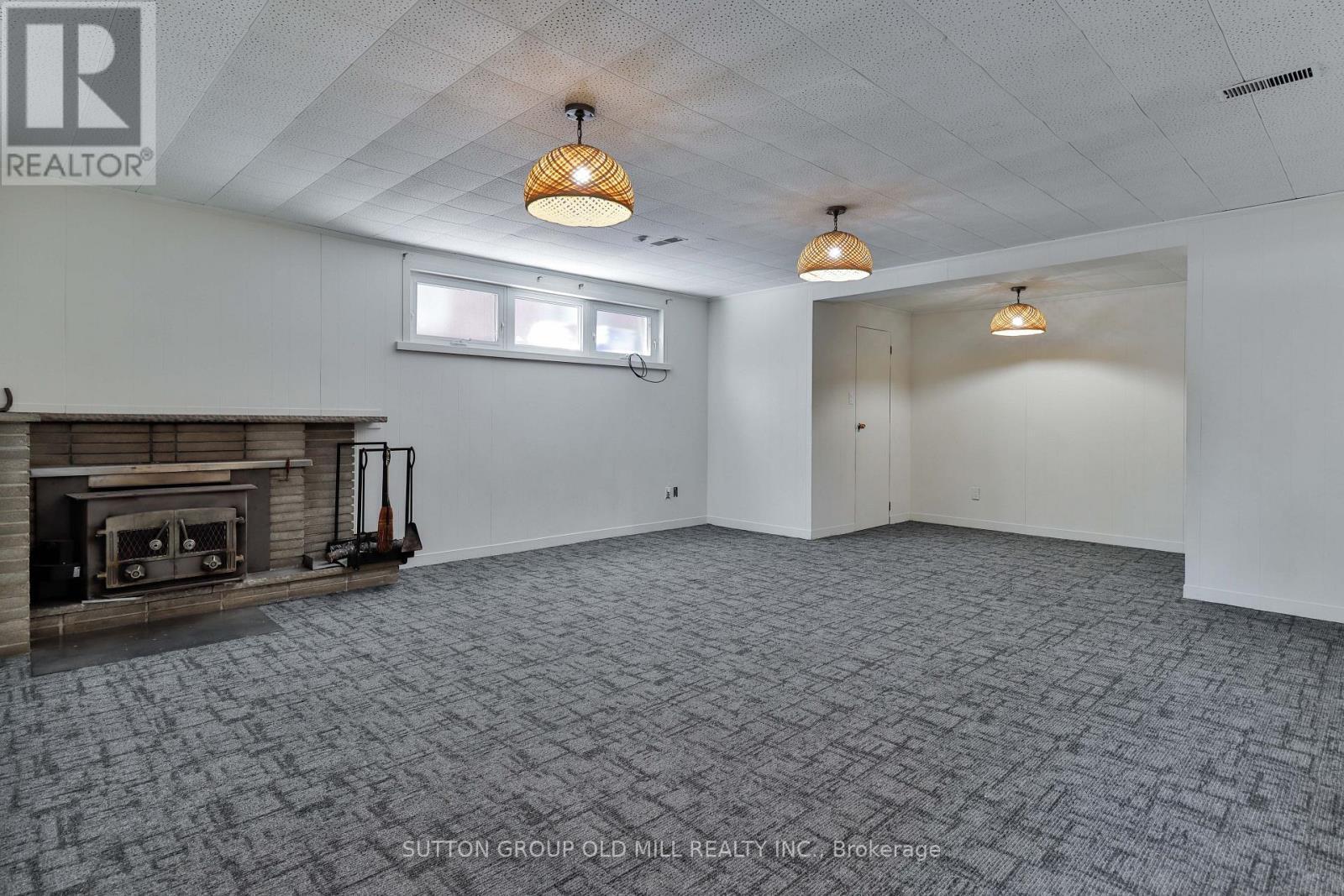 15 Manorhampton Drive, Toronto, ON - Indoor With Fireplace