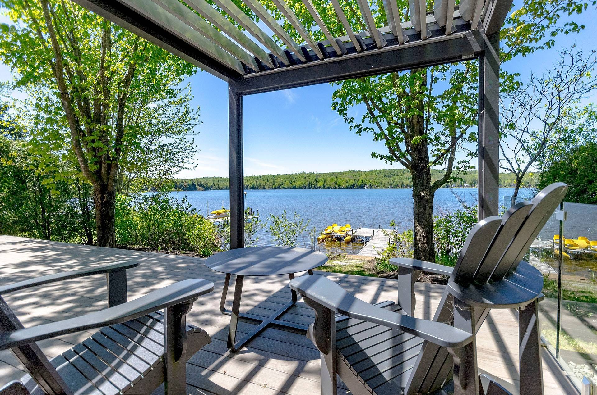 Vue sur l'eau - 230 Rue Larose, Dunham, QC - Outdoor With Body Of Water With Deck Patio Veranda With View