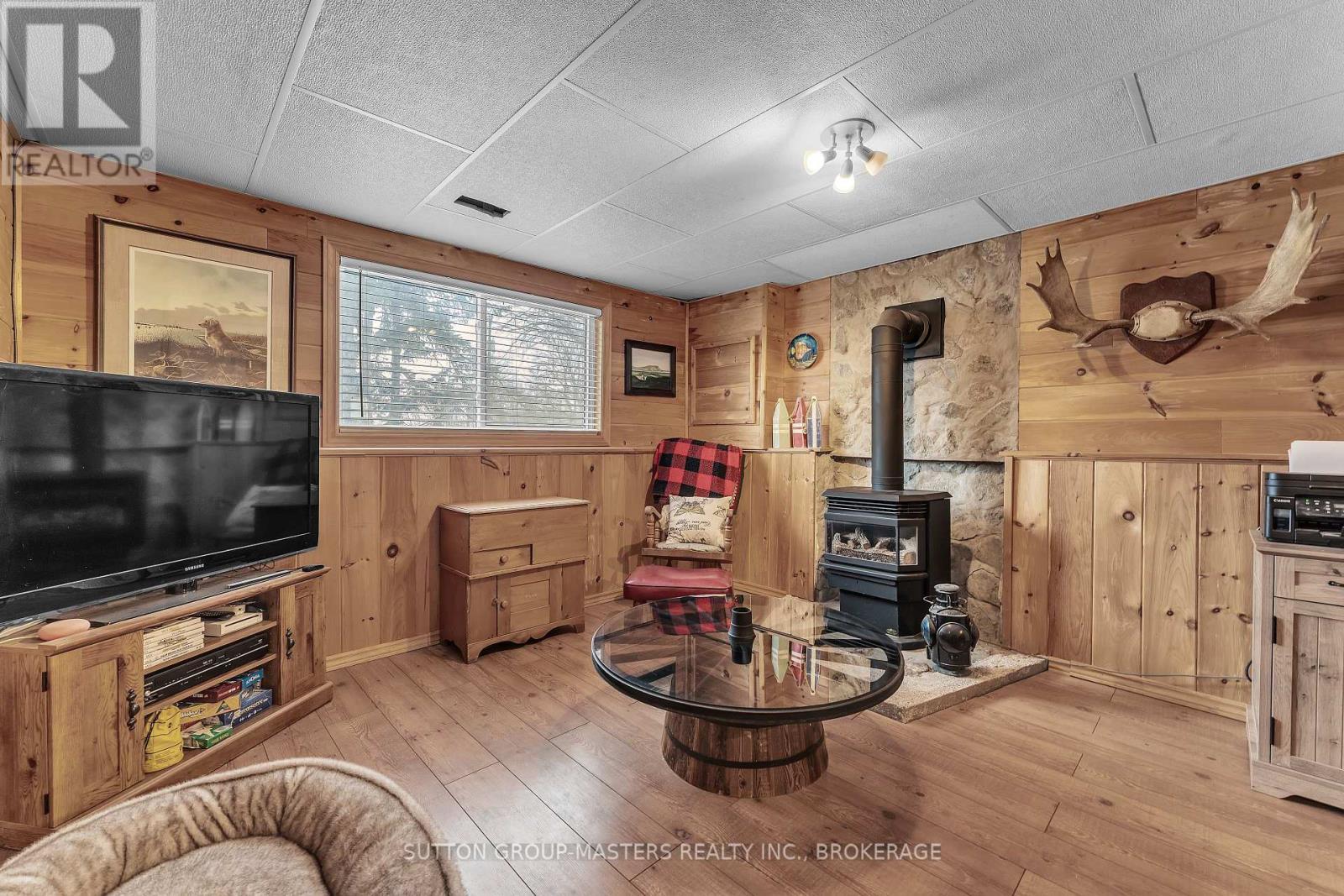 156 Pruyn Crescent, Loyalist (Bath), ON - Indoor With Fireplace