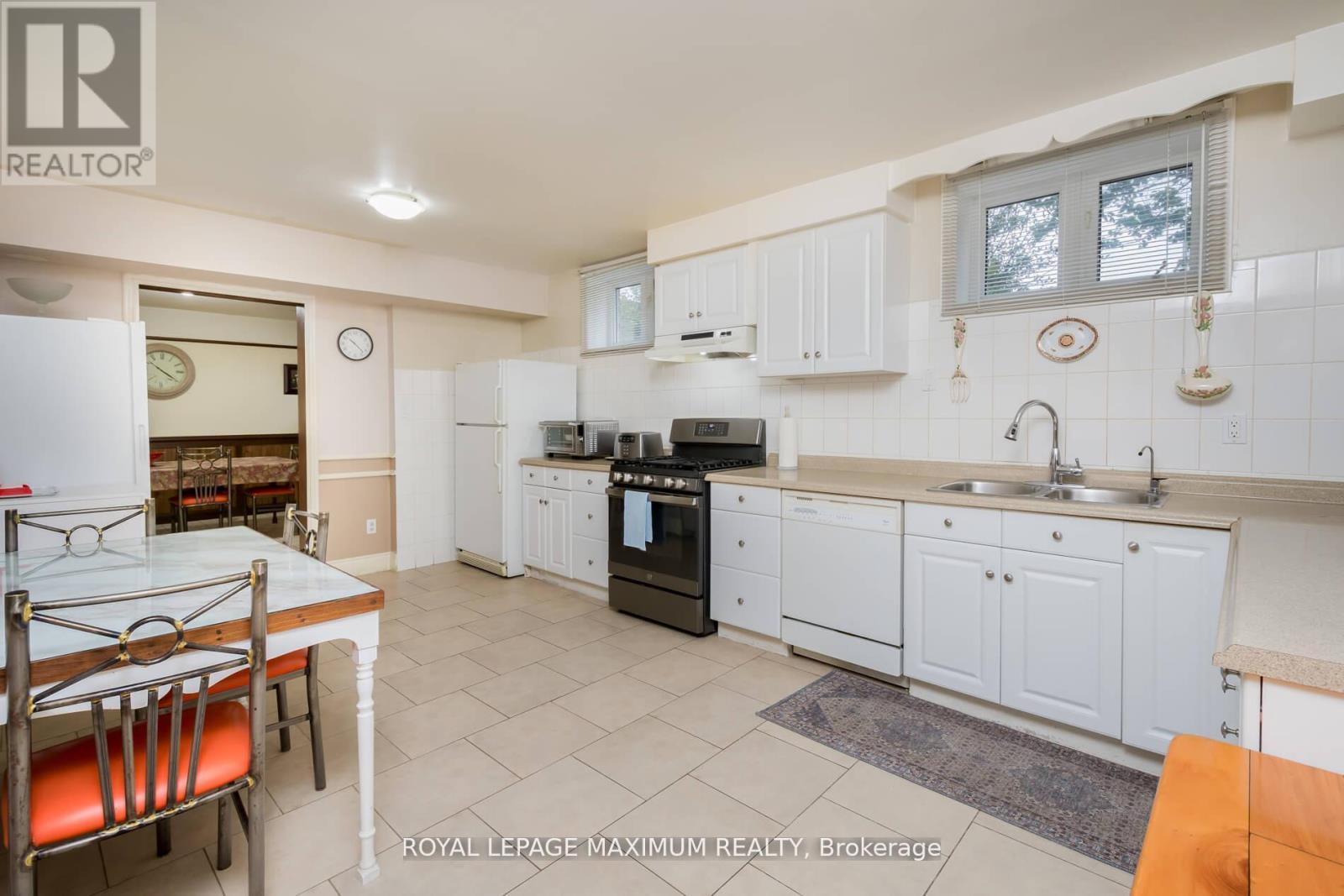 119 Glen Long Avenue, Toronto, ON - Indoor Photo Showing Kitchen With Double Sink