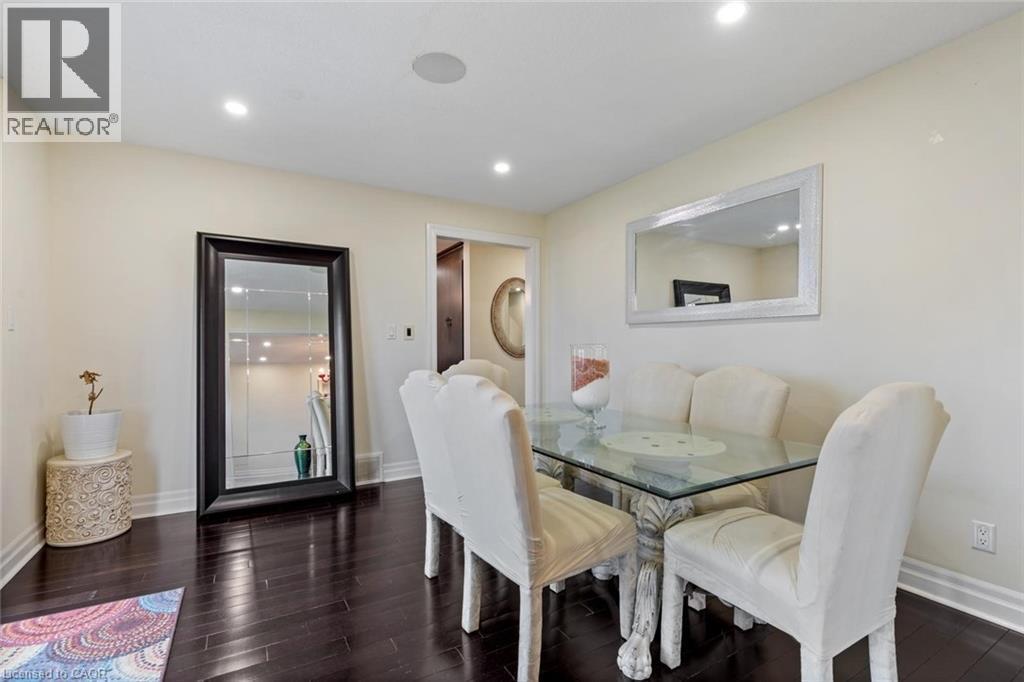 Dining room featuring dark hardwood / wood-style floors - 1073 North Service Road, Hamilton, ON - Indoor Photo Showing Dining Room