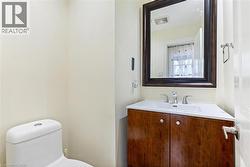 Bathroom with vanity and toilet -
