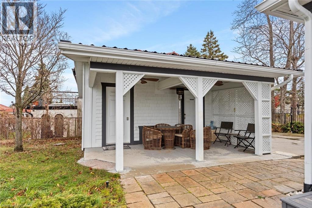 View of patio with ceiling fan - 1073 North Service Road, Hamilton, ON - Outdoor