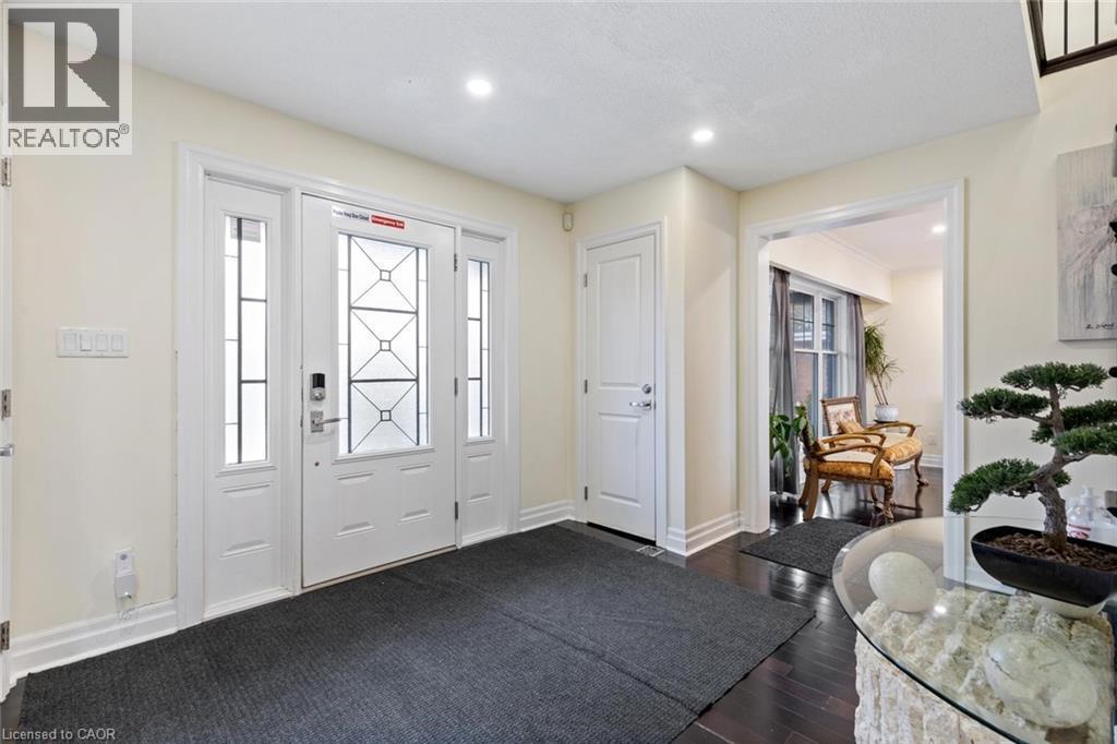 Entrance foyer with dark hardwood / wood-style flooring - 1073 North Service Road, Hamilton, ON - Indoor Photo Showing Other Room