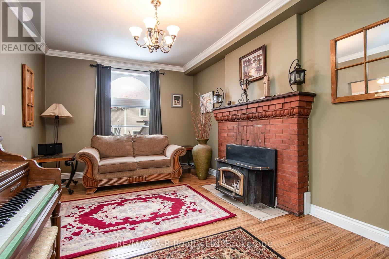 56 West Gore Street, Stratford, ON - Indoor Photo Showing Living Room With Fireplace