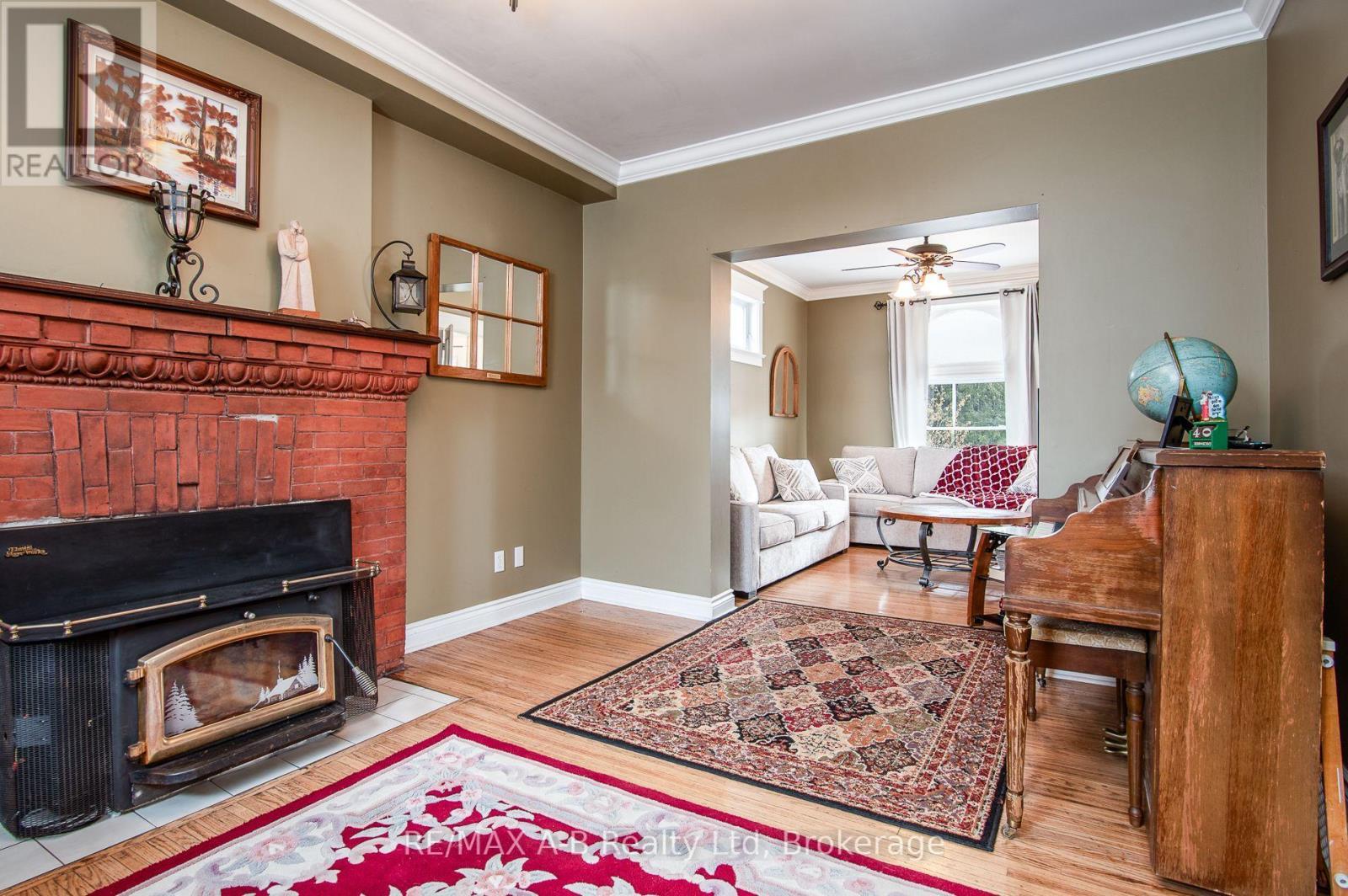 56 West Gore Street, Stratford, ON - Indoor Photo Showing Living Room With Fireplace