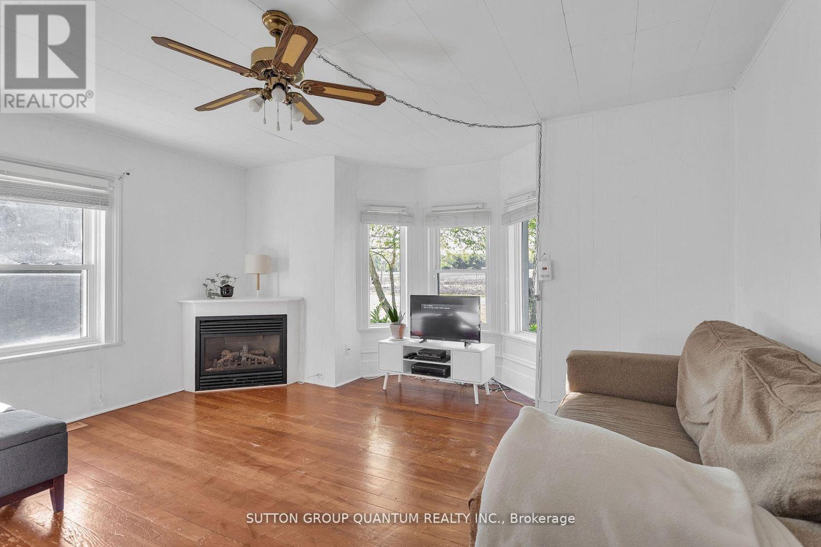 442 First Concession Road, Norfolk, ON - Indoor Photo Showing Living Room With Fireplace
