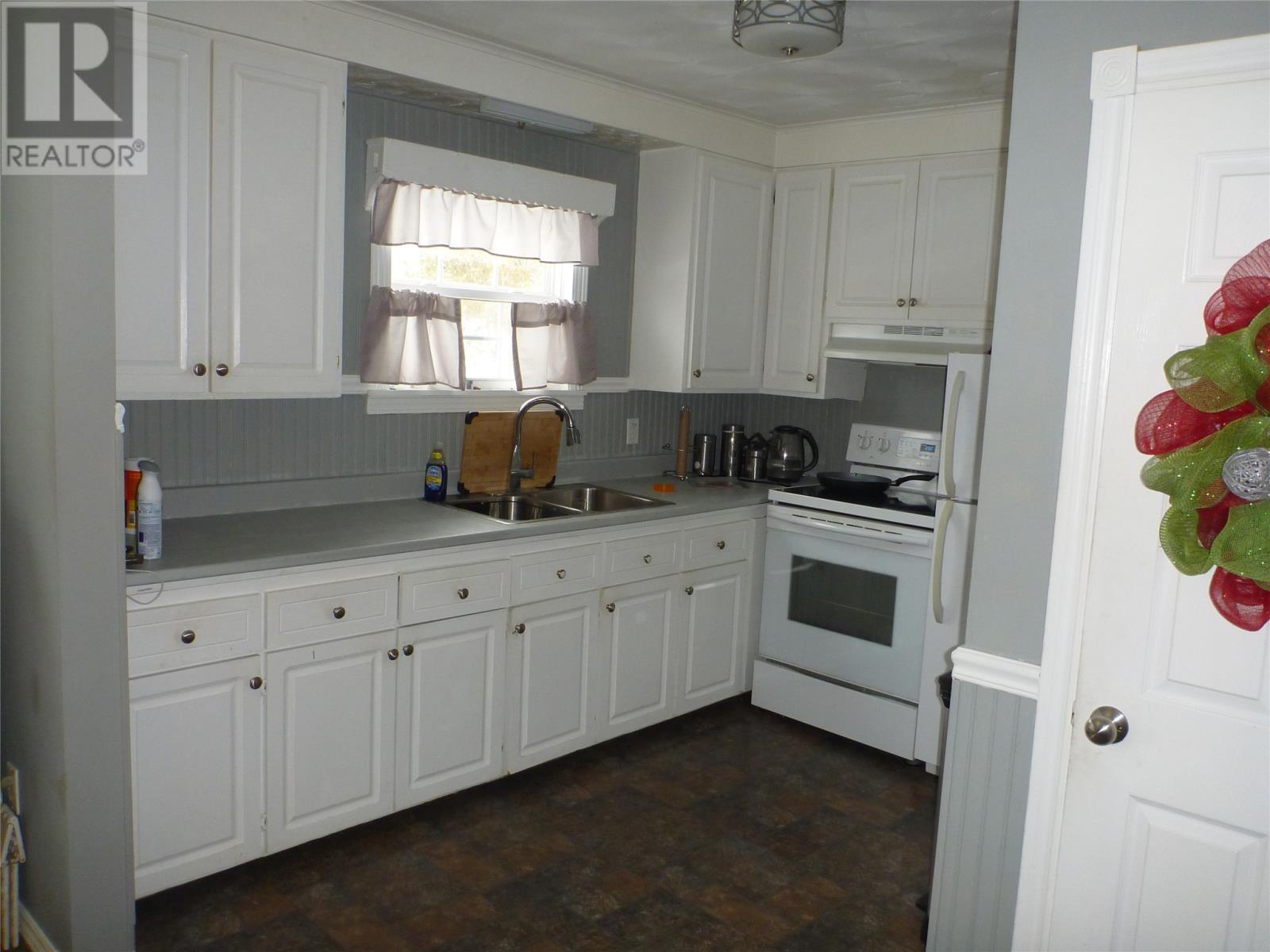 4 Baggs Place, Clarenville, NL - Indoor Photo Showing Kitchen With Double Sink