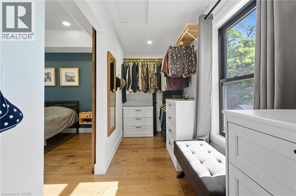Spacious closet with light wood finished floors and attic access - 115 Lakeshore Road, Port Burwell, ON - Indoor Photo Showing Other Room