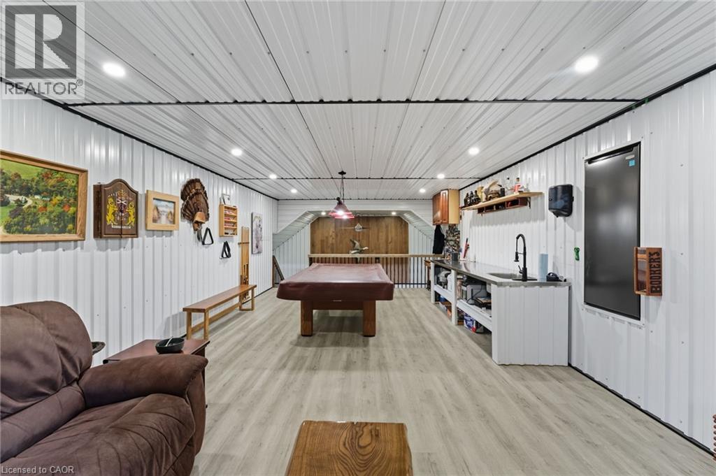 Rec room featuring billiards table and light wood-type flooring - 115 Lakeshore Road, Port Burwell, ON - Photo Showing Other Room