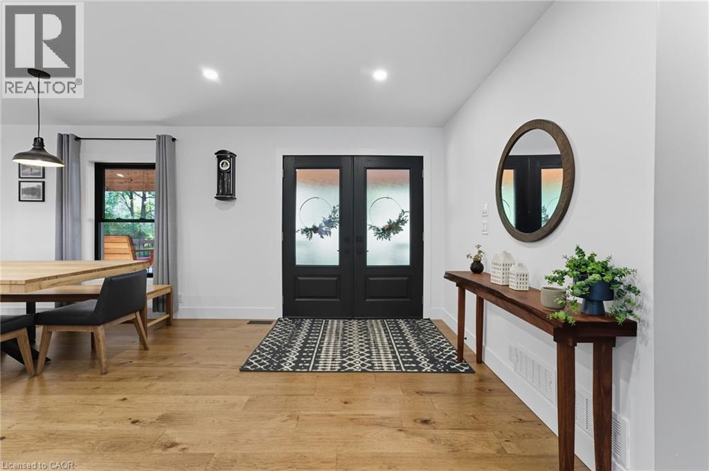 Foyer with light wood-style floors, french doors, and recessed lighting - 115 Lakeshore Road, Port Burwell, ON - Indoor Photo Showing Dining Room