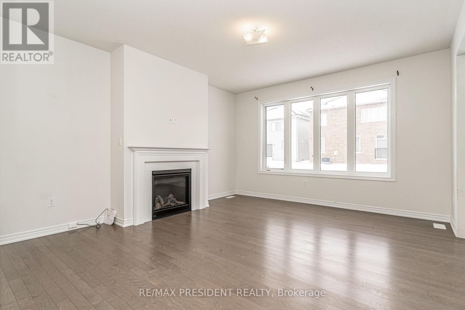 663 Anishinaabe Drive, Shelburne, ON - Indoor Photo Showing Other Room With Fireplace